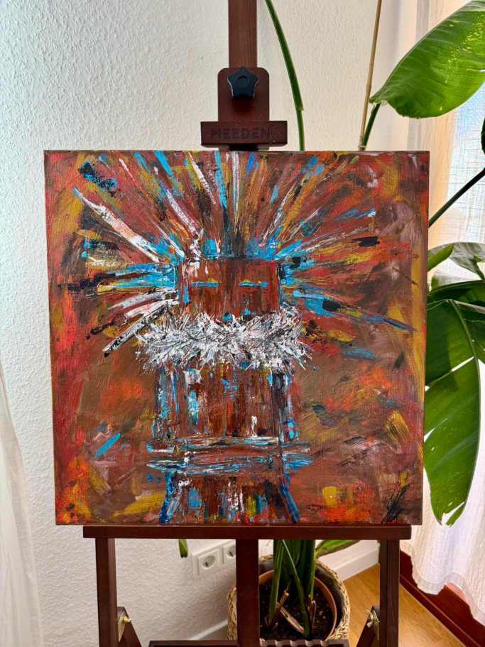 Farbige abstrakte Malerei mit dynamischen Linien und Formen auf einer Staffelei.