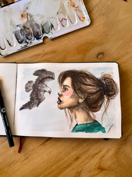 Porträt einer Frau mit einem Vogel, skizziert in einem Skizzenbuch.